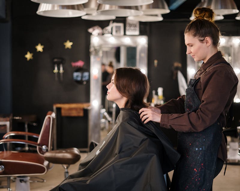 a woman in a hair salon